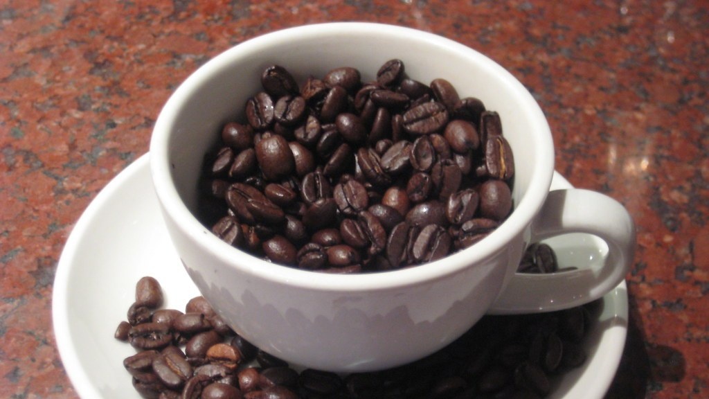 Does ground coffee weigh the same as beans?